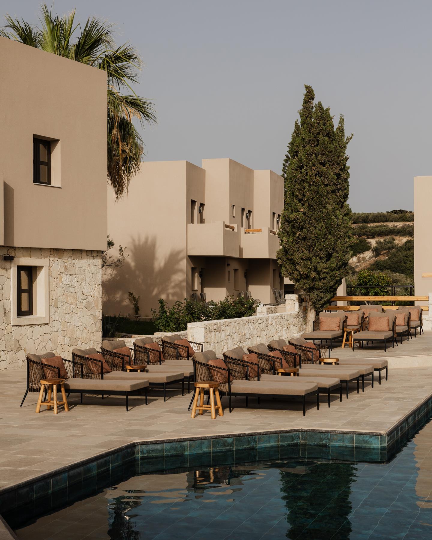 Pool gardens and architecture at MOMI Slow Living Hotel