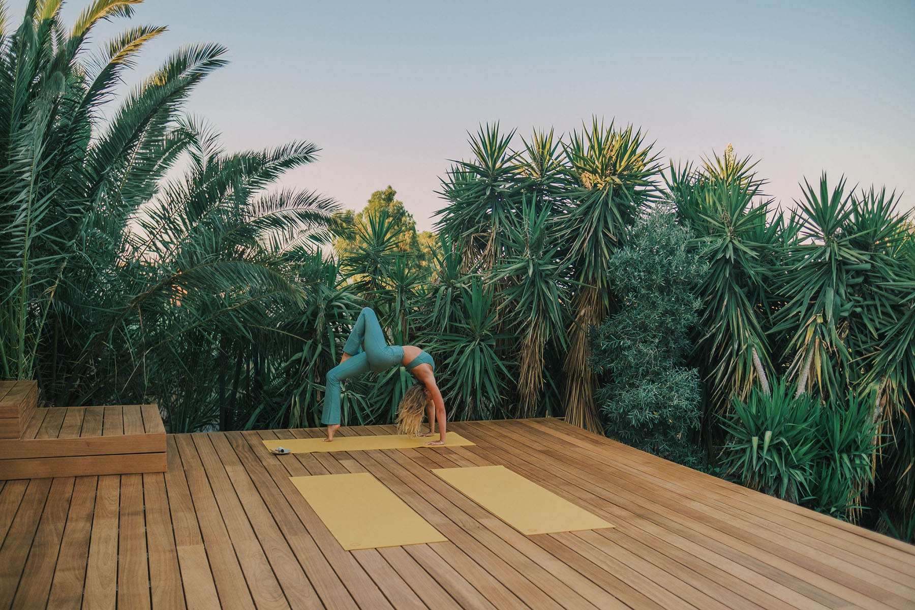The open-air Yoga Deck at Momi surrounded by nature